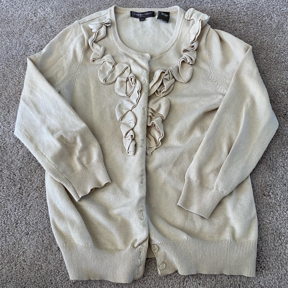 Cream cardigan with ruffle detail
